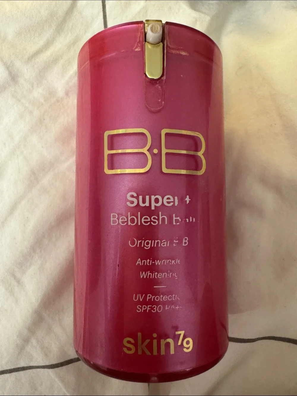 Skin Brightening BB Cream Pump in Pink with Gold Accents
